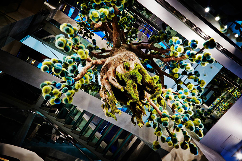azuma makoto suspends fur tree inside FENDI pop-up boutique in tokyo