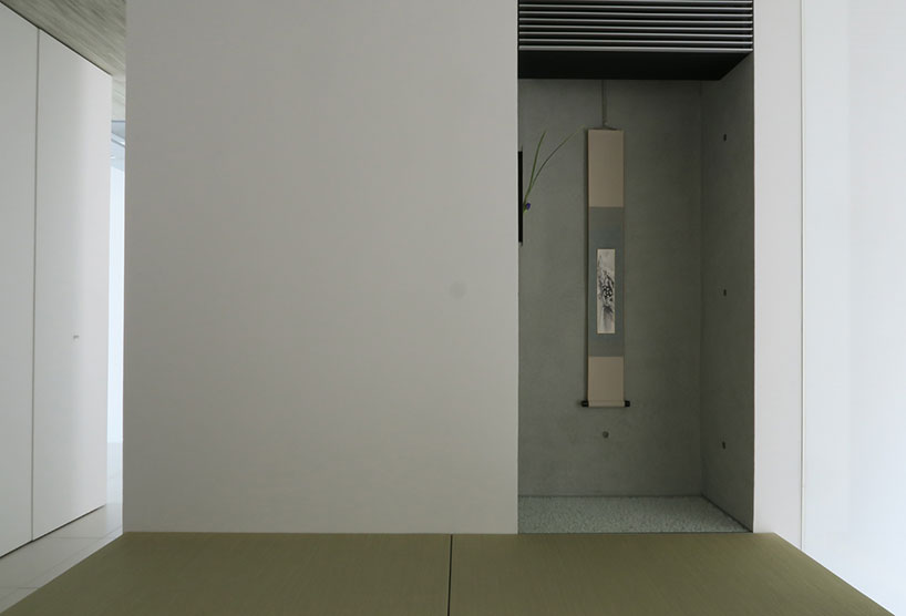 kubota architect atelier fits YA house between floating planes in japan