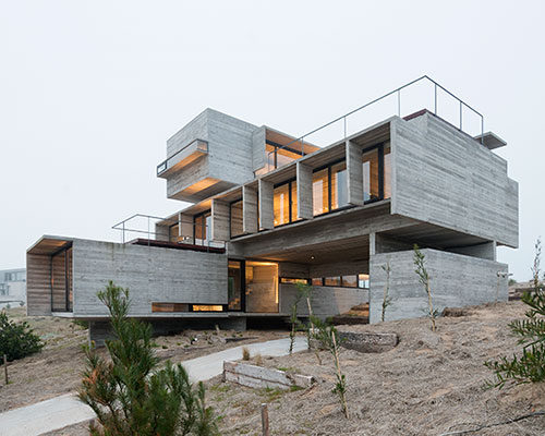 luciano kruk constructs casa golf from concrete planes in argentina