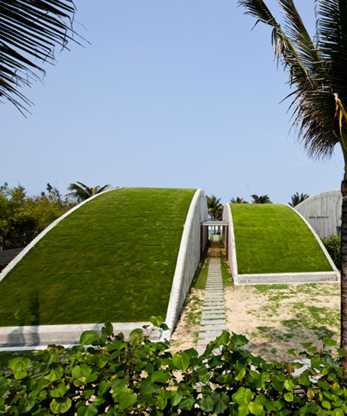 undulating green villas finalize vo trong nghia's naman retreat in coastal vietnam