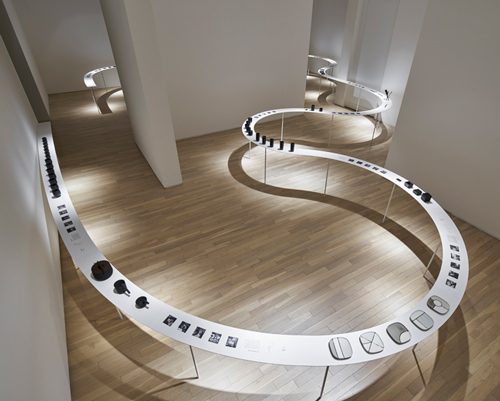 continuous winding display presents nendo's tableware collection in tokyo