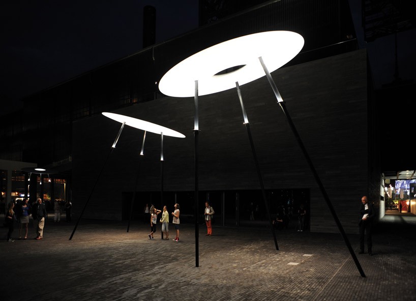 ingo maurer's guddevol street lights create an intimate setting in luxembourg