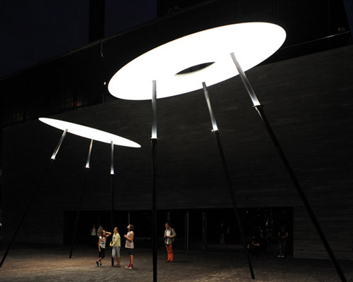 ingo maurer's guddevol street lights create an intimate setting in luxembourg