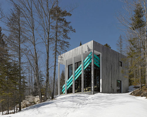 architecturama clads lake jasper house in canada with white cedar siding