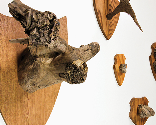 brothers dressler craft a species of wooden tree trophies at IDS toronto