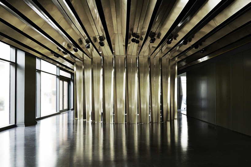 folded brass ribbons envelope bureau de change's london office design