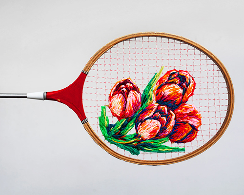 danielle clough embroiders flowers into vintage rackets