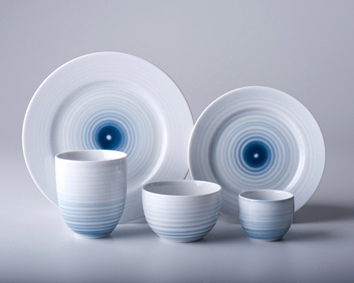 edyta cieloch adds blue gestures to ceramic tableware collection