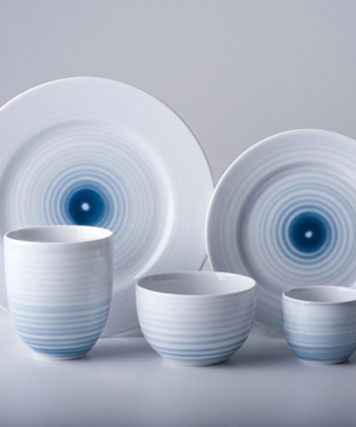 edyta cieloch adds blue gestures to ceramic tableware collection