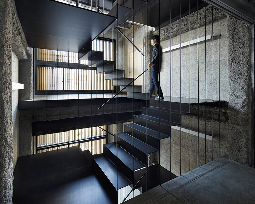 florian busch disguises eight storey nightlife venue in kyoto with louvered timber façade