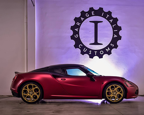 lapo elkann's garage italia customs splashes two-tone black and red over alfa romeo 4C