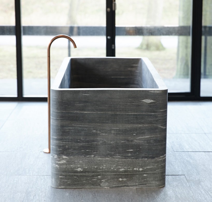 jonas lindvall stone bathroom vals quartz designboom