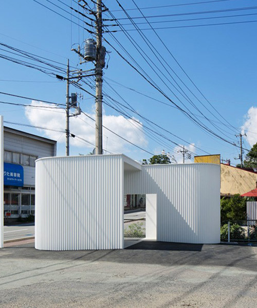 kubo tsushima places minimalist public toilet in a japanese parking lot