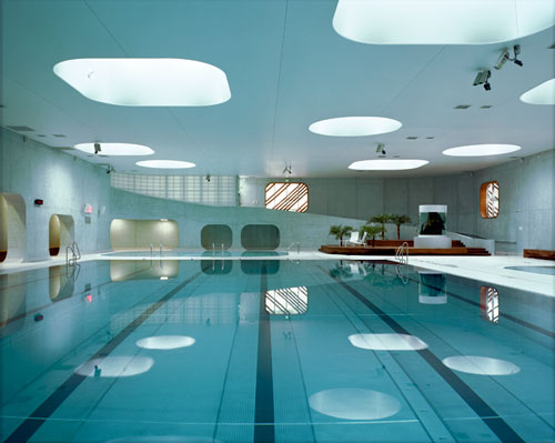 rounded skylights illuminate mikou studio's pool facility in france