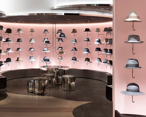 nendo uses hats to create wall of umbrellas inside tokyo's seibu shibuya store