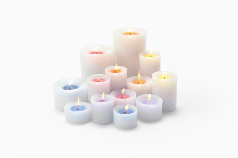 nendo's sunset candles slowly reveal color as they burn