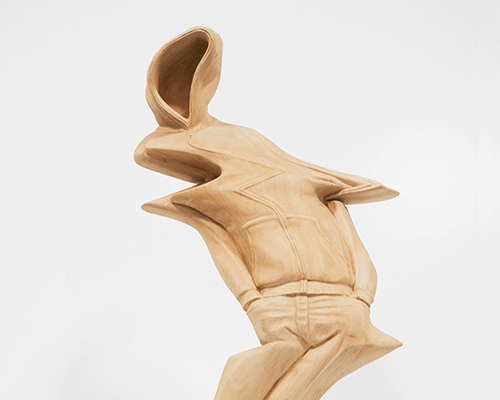 paul kaptein hand carves warped wooden figures with digital glitches