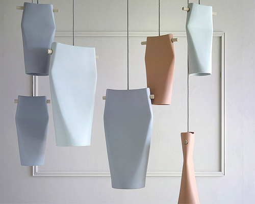 skrivo reinterprets clay throwing processes to create asymmetrical-shaped lamps