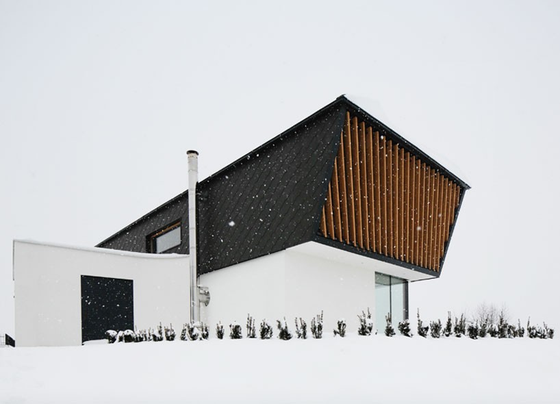sono architects organizes contemporary slovenian home in a triangular composition