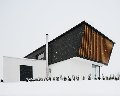 sono architects organizes contemporary slovenian home in a triangular composition