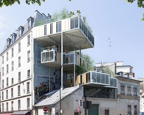 stéphane malka positions modular housing units on rooftops in paris