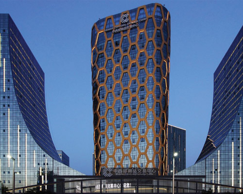 honey comb façade covers mcec exchange centre by interdesign + hugo kohno