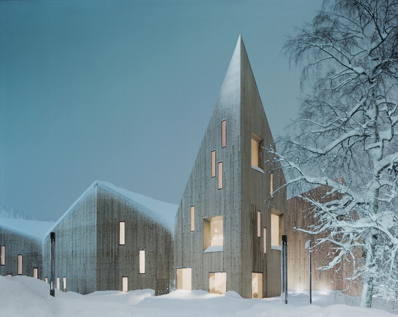 reiulf ramstad's timber romsdal folk museum in norway topped with angular roofline