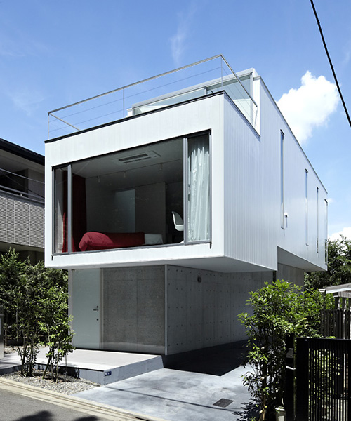 A.L.X. / junichi sampei fits denenchofu house on a narrow plot in suburban tokyo