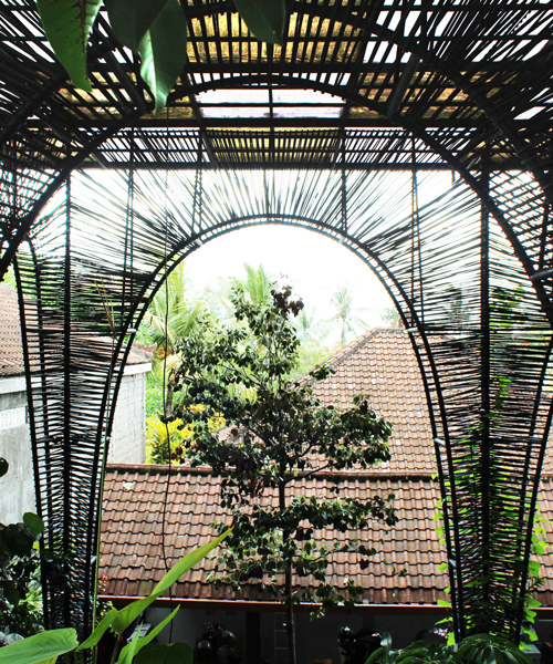 bali restaurant by alexis dornier features canopy made from recycled truck tires