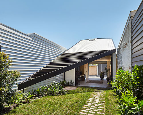 architecture architecture's kite addition explores the use of the triangle