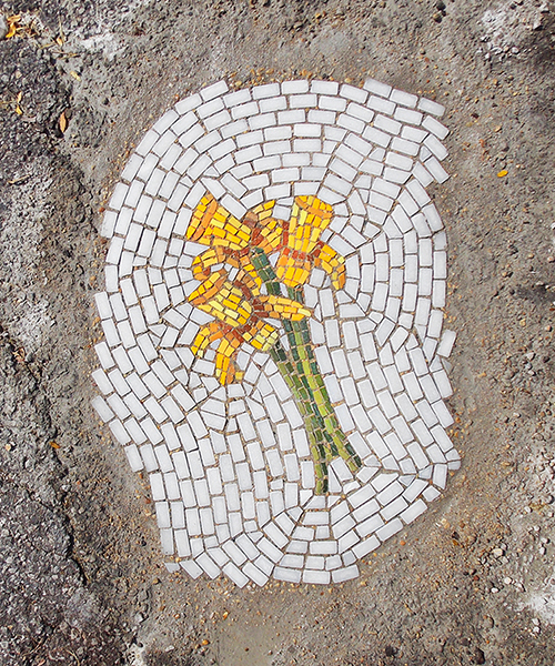 bachor fills unsightly city potholes with vibrant glass and marble mosaics
