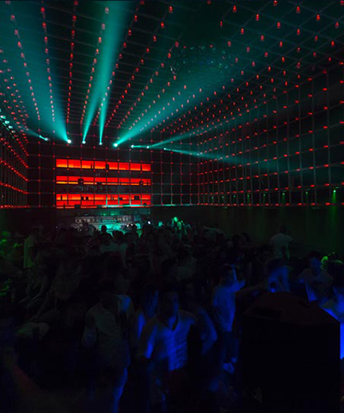 guto requena transforms industrial space into interactive dance club in brazil