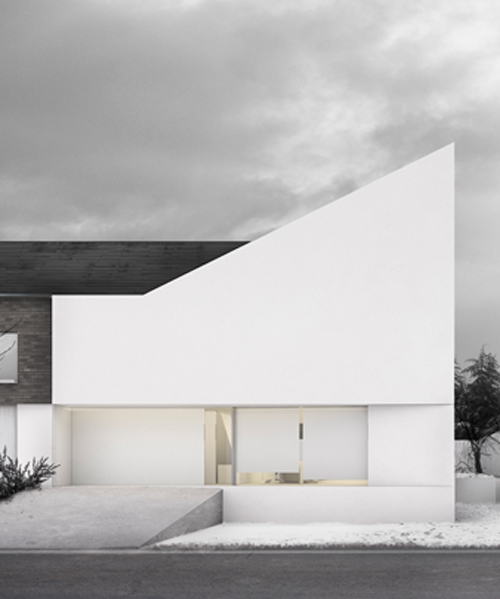 fran silvestre defines home extension with dramatic angular roofline in brussels