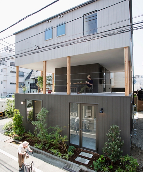furuya design lifts upper level of japanese house to form sheltered balcony
