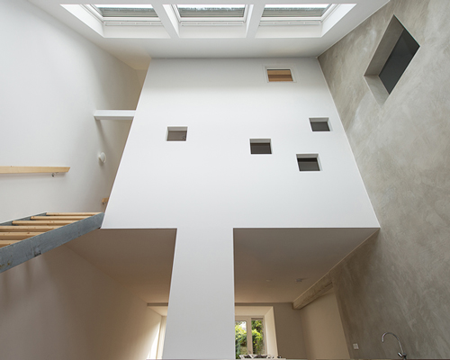 global architects reinvents terraced property with 'house in house' concept