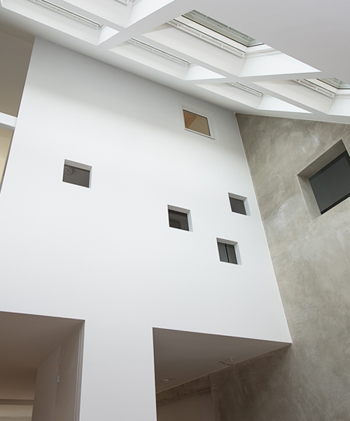 global architects reinvents terraced property with 'house in house' concept