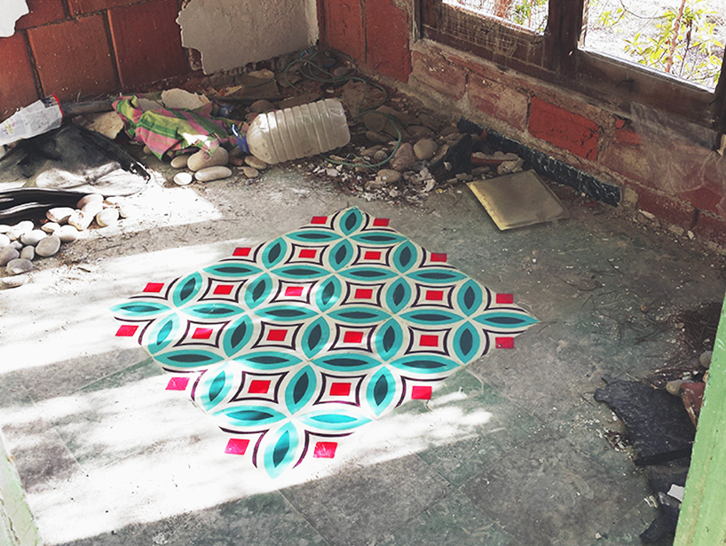 javier de riba paints patterned tiles onto floors of abandoned urban spaces