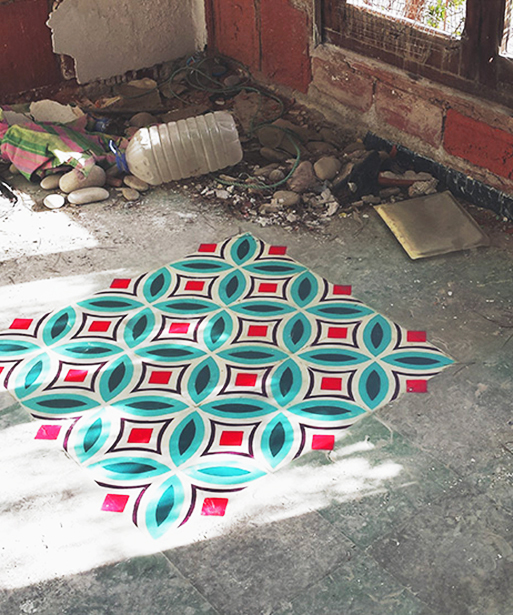 javier de riba paints patterned tiles onto floors of abandoned urban spaces