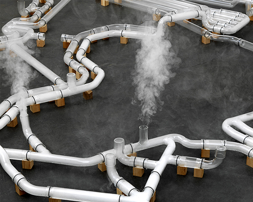 jeroen vaan loon materializes a glass internet filled with smoke signals