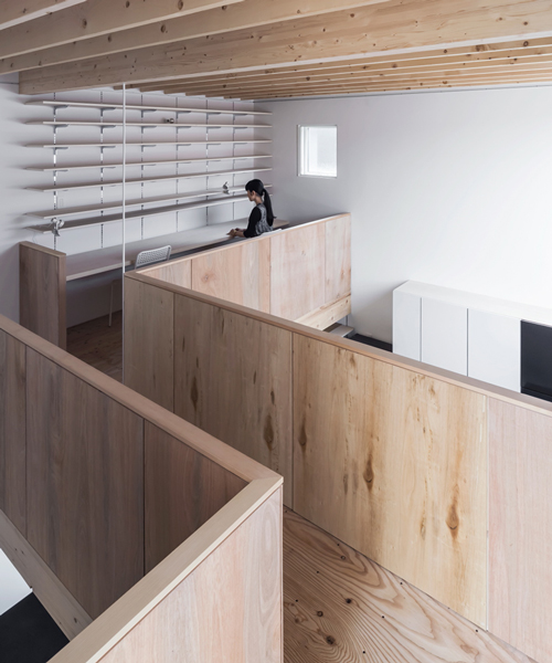 jun igarashi organizes artist-studio home within connected wooden blocks in japan