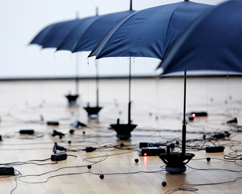 kouichi okamoto's rain installation expresses gravity, magnetic forces, and sound