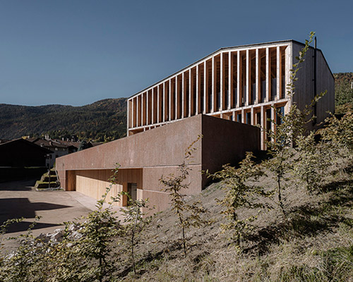 mirko franzoso designs timber community house for the italian village of caltron