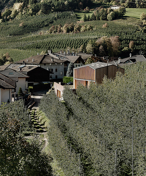 mirko franzoso designs timber community house for the italian village of caltron