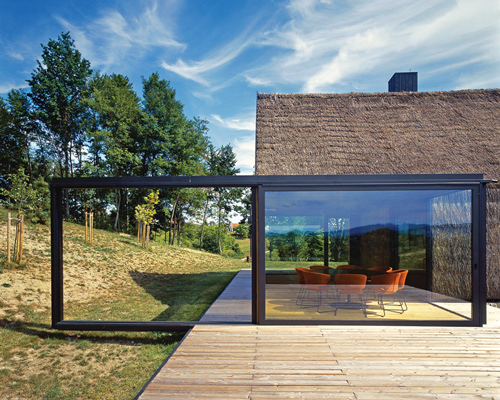 proarh adds glass intervention to traditional farmers cottage in croatia