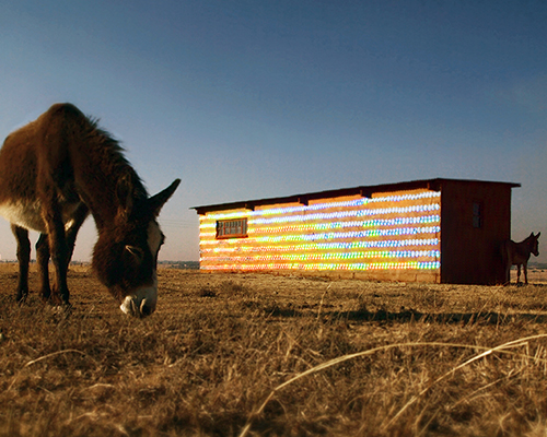 r1 turns a derelict farmhouse in south africa into a glistening landmark with 1000 CDs