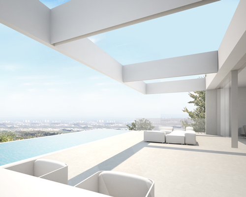 ramon esteve embeds monolithic quarry house into hillside in valencia