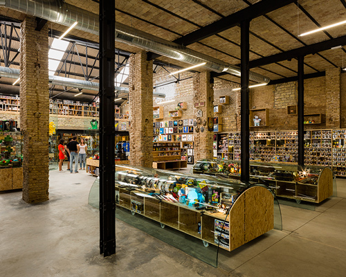 serrano + baquero transforms seville warehouse to include comic book store