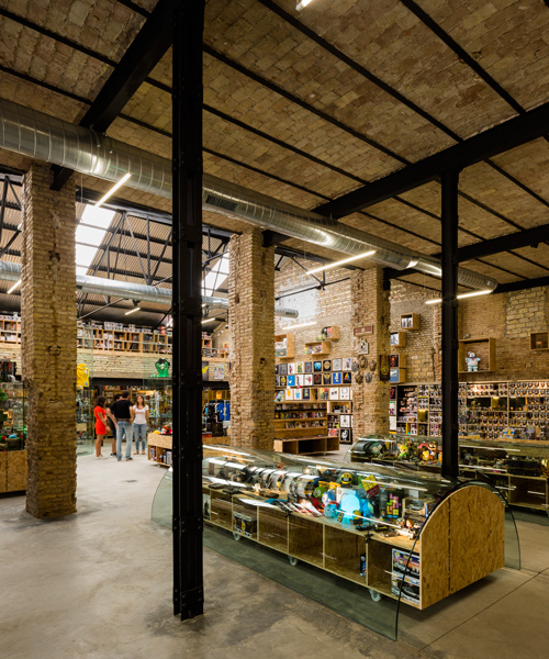 serrano + baquero transforms seville warehouse to include comic book store