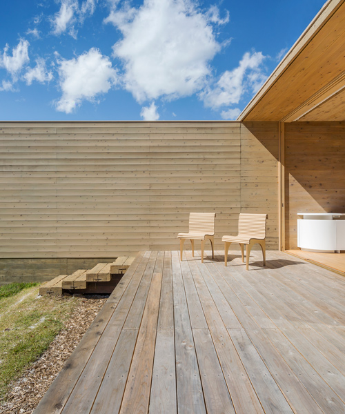 shigeru ban designs 'miesian' house in japan built from solid cedar