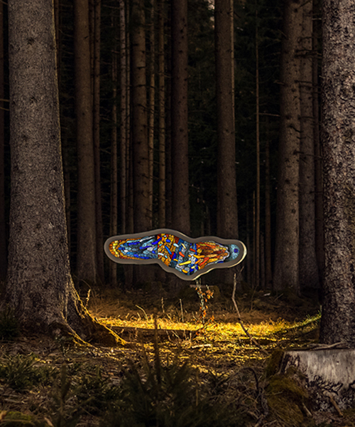 thomas medicus sets surreal stained glass amoeba sculpture in the woods
